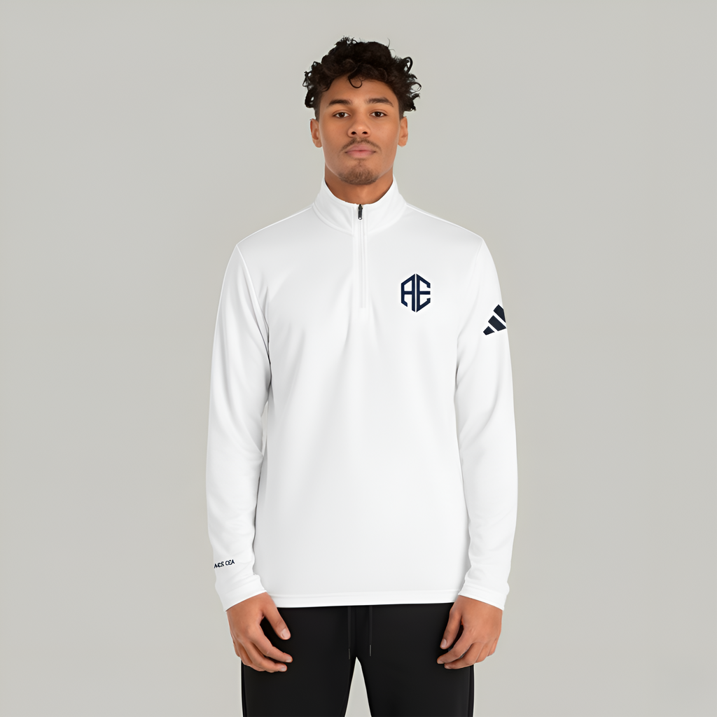 Man wearing a white sports jacket with logos on a gray background